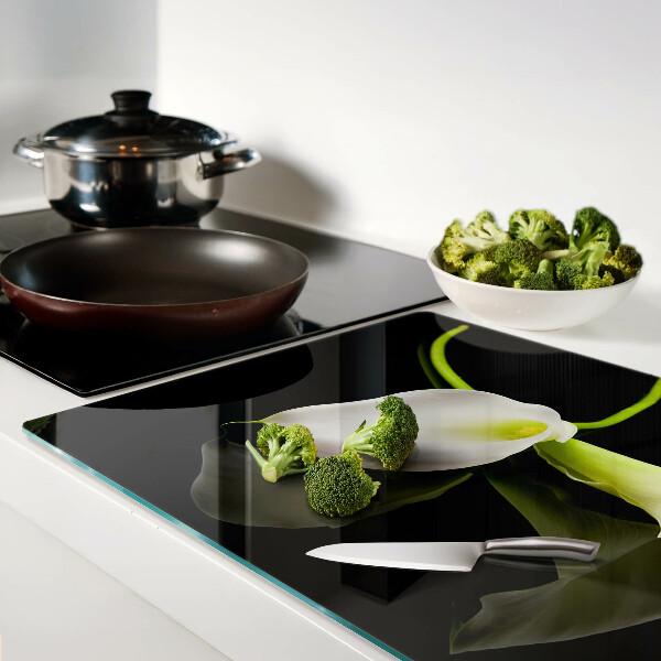 Glazen snijplanken Lelie op een zwarte achtergrond