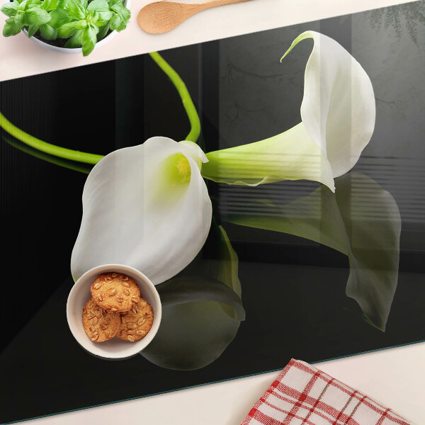 Glazen snijplanken Lelie op een zwarte achtergrond