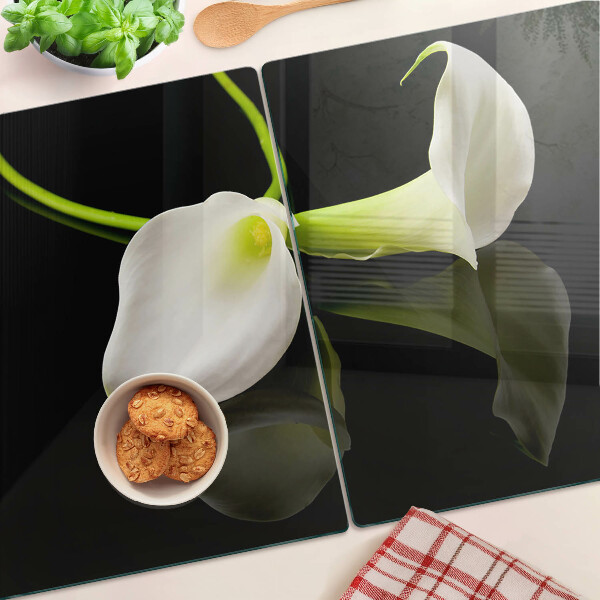 Glazen snijplanken Lelie op een zwarte achtergrond