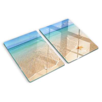 Snijplanken glas Strand met schelpen en golven