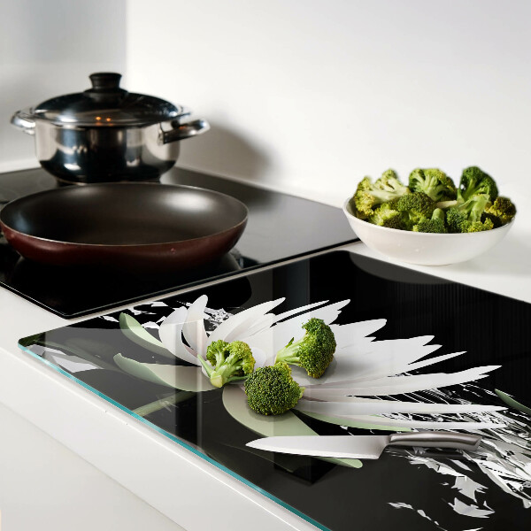 Glazen snijplanken Waterlelies op een zwarte achtergrond