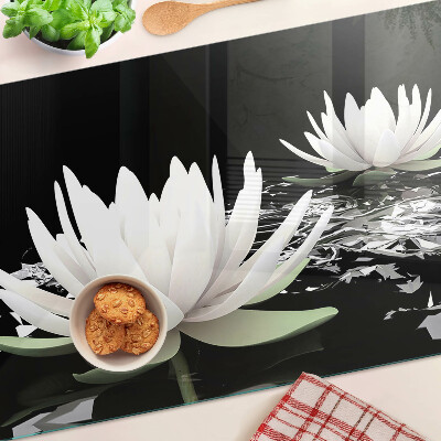 Glazen snijplanken Waterlelies op een zwarte achtergrond