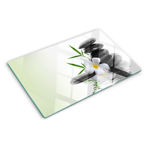 Snijplanken glas Bloemen en stenen op het water