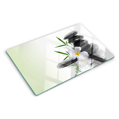 Snijplanken glas Bloemen en stenen op het water