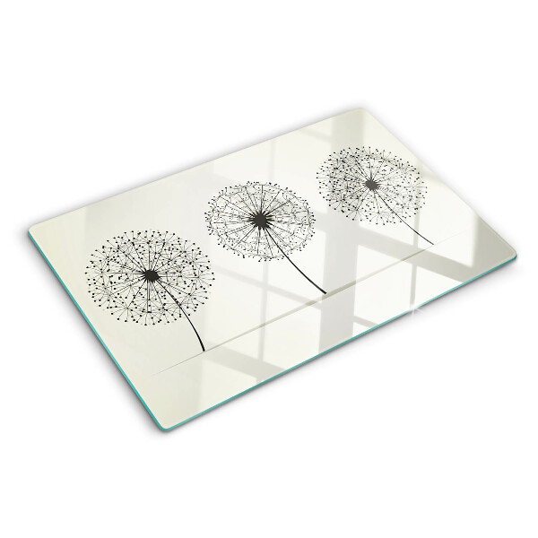 Snijplanken glas Paardenbloemen op een witte achtergrond