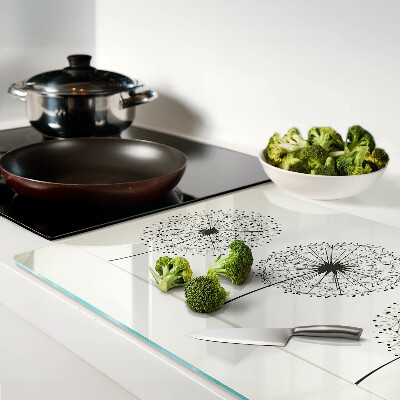 Snijplanken glas Paardenbloemen op een witte achtergrond