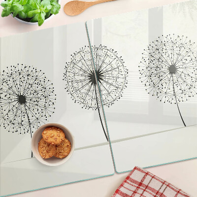 Snijplanken glas Paardenbloemen op een witte achtergrond