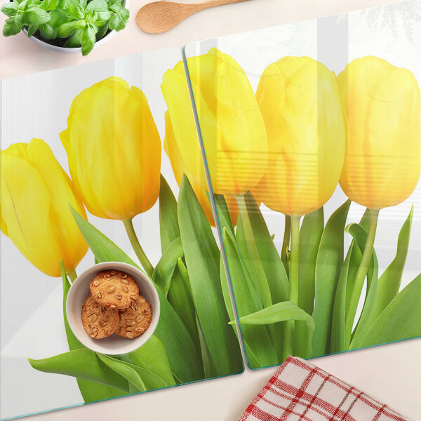 Snijplanken glas Gele tulpen op een groene achtergrond