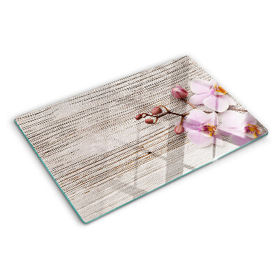 Snijplanken glas Orchideeën op een houten achtergrond