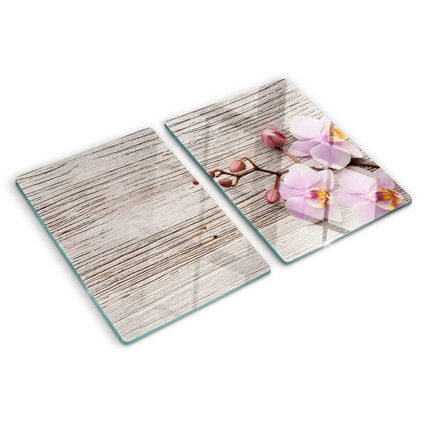 Snijplanken glas Orchideeën op een houten achtergrond