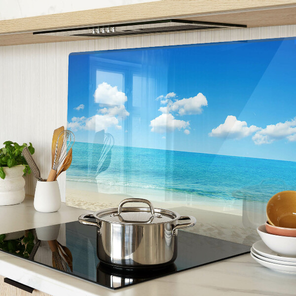 Snijplanken glas Strand met een blauwe lucht