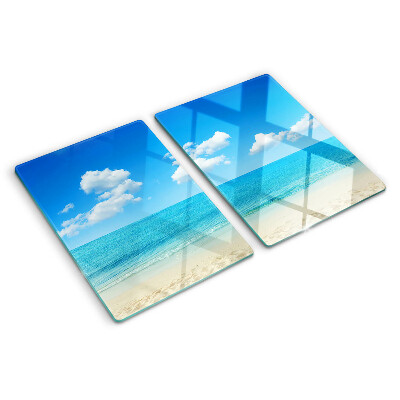 Snijplanken glas Strand met een blauwe lucht