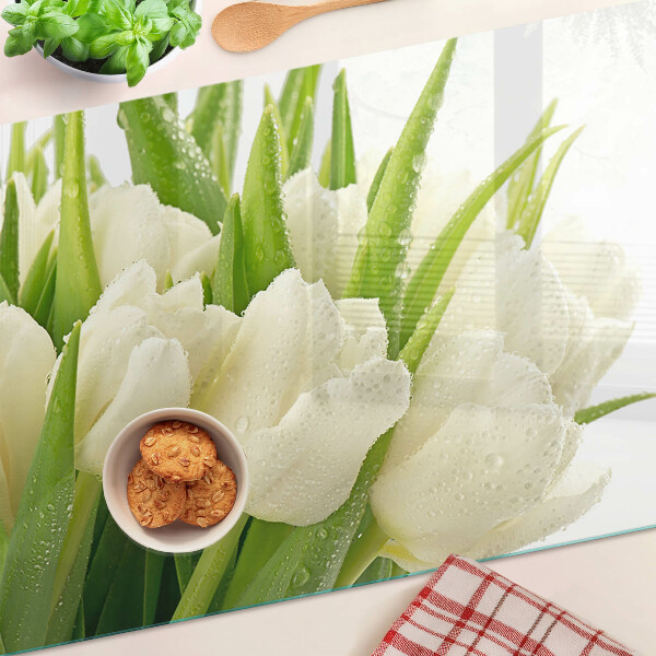 Snijplanken van glas Tulpen in waterdruppels