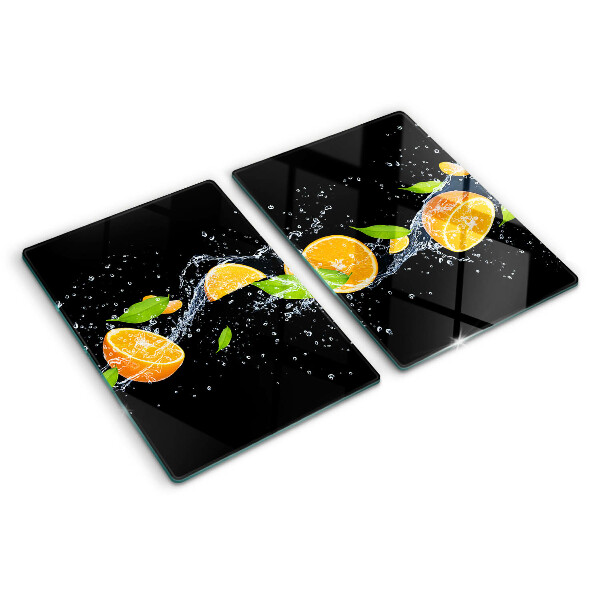 Snijplanken glas Citrusvruchten in water