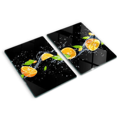 Snijplanken glas Citrusvruchten in water