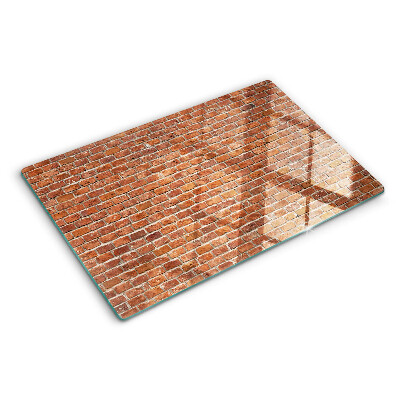 Snijplanken van glas Bakstenen muur