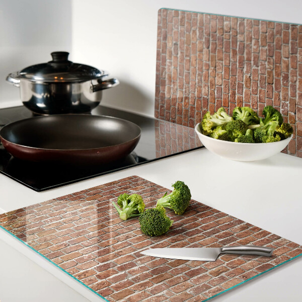 Snijplanken van glas Bakstenen muur