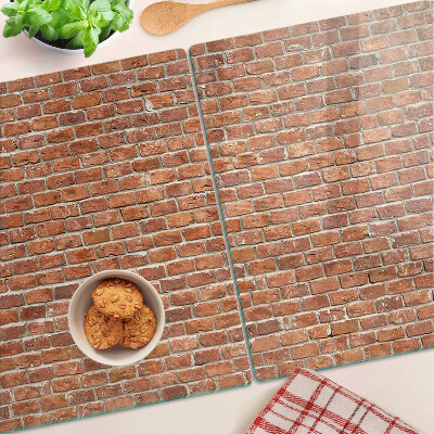 Snijplanken van glas Bakstenen muur