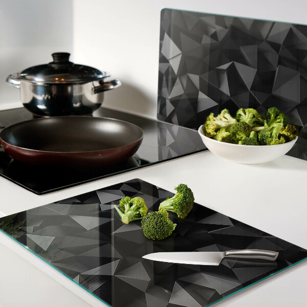 Snijplanken van glas Veelhoekige geometrie in zwarttinten