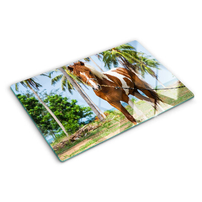 Glazen snijplanken Een paard met palmbomen op de achtergrond.