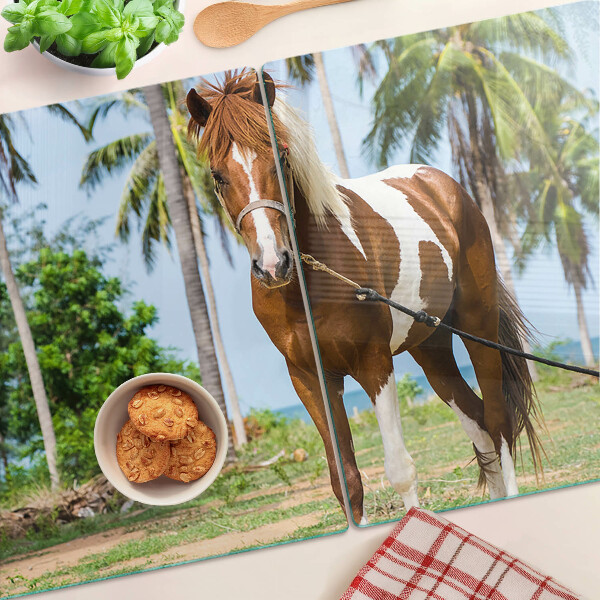 Glazen snijplanken Een paard met palmbomen op de achtergrond.