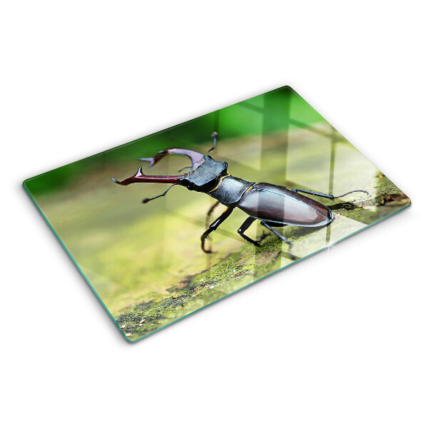 Glazen snijplanken Hertkever op een groene achtergrond