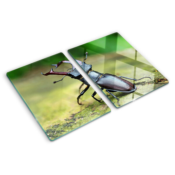 Glazen snijplanken Hertkever op een groene achtergrond