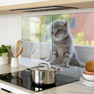 Glazen snijplanken Een kitten op de vensterbank.