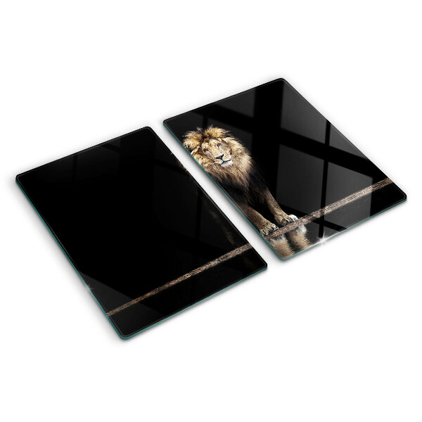 Snijplanken glas Leeuw op een donkere achtergrond