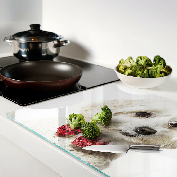 Glazen snijplanken Een hond in een trui met een strik.