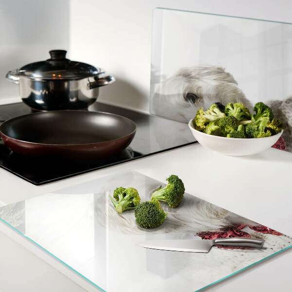 Glazen snijplanken Een hond in een trui met een strik.