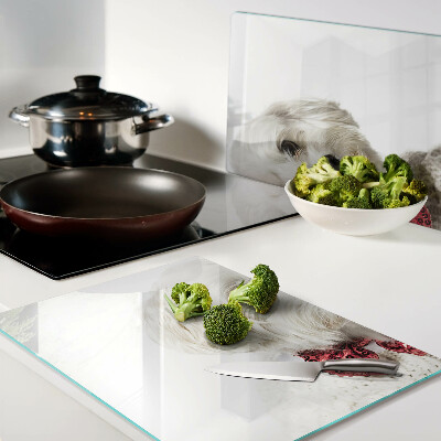 Glazen snijplanken Een hond in een trui met een strik.