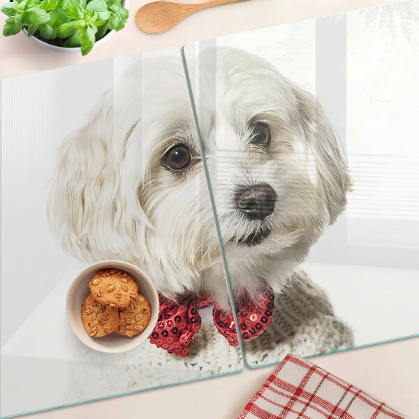 Glazen snijplanken Een hond in een trui met een strik.