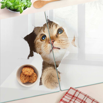 Snijplanken glas Een kat die door een gat in de muur kijkt.