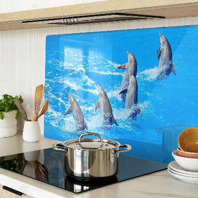 Glazen snijplanken Dolfijnen die over de golven springen