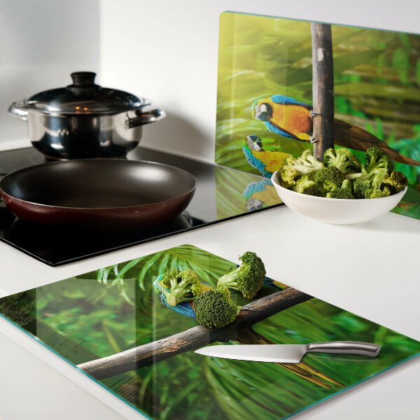 Snijplanken glas Papegaaien op een tak in de tropen