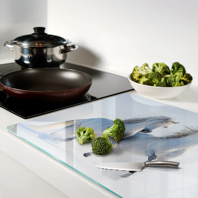 Glazen snijplanken Twee witte paarden in een dolle galop.