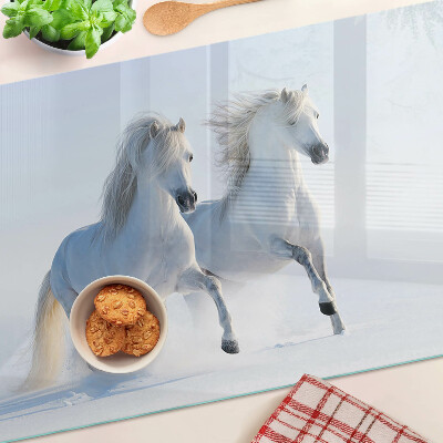 Glazen snijplanken Twee witte paarden in een dolle galop.