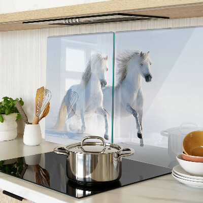 Glazen snijplanken Twee witte paarden in een dolle galop.