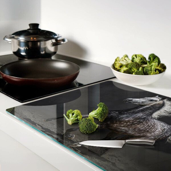 Snijplanken van glas Een gevlekt paard op de vlucht