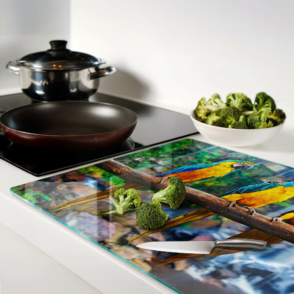 Glazen snijplanken Papegaaien op een tak in een tropisch bos