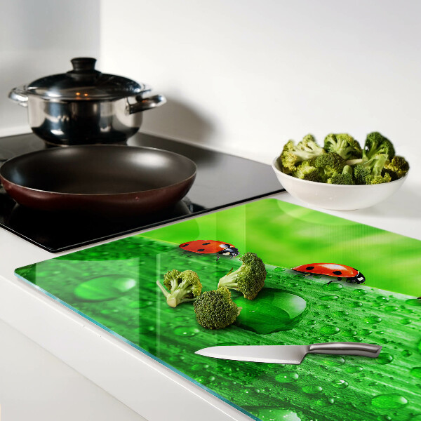 Snijplanken glas Lieveheersbeestjes op een groene achtergrond