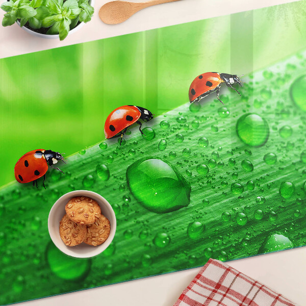 Snijplanken glas Lieveheersbeestjes op een groene achtergrond