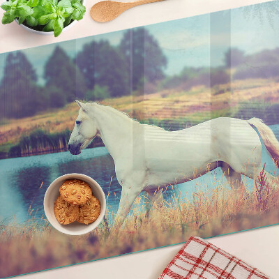 Snijplanken van glas Wit paard aan het water