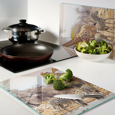 Snijplanken van glas Zebra's en giraffen in hun natuurlijke leefomgeving