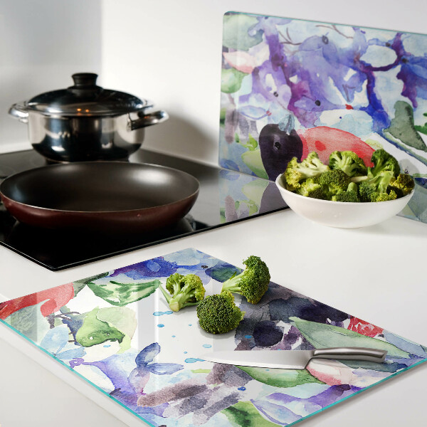 Snijplanken van glas Een vogel tegen een achtergrond van bloemen