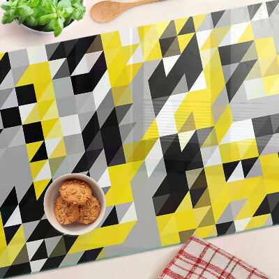 Snijplanken van glas Geometrische vormen in geel en zwart.