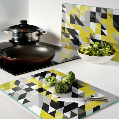 Snijplanken van glas Geometrische vormen in geel en zwart.