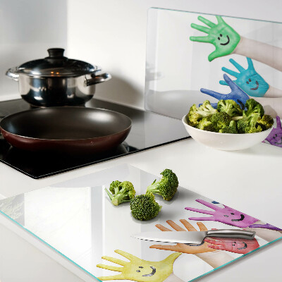 Snijplanken van glas Kleurrijke lachende handen