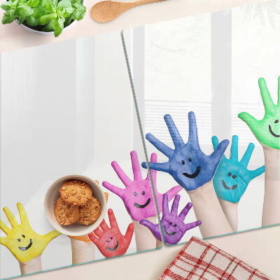 Snijplanken van glas Kleurrijke lachende handen